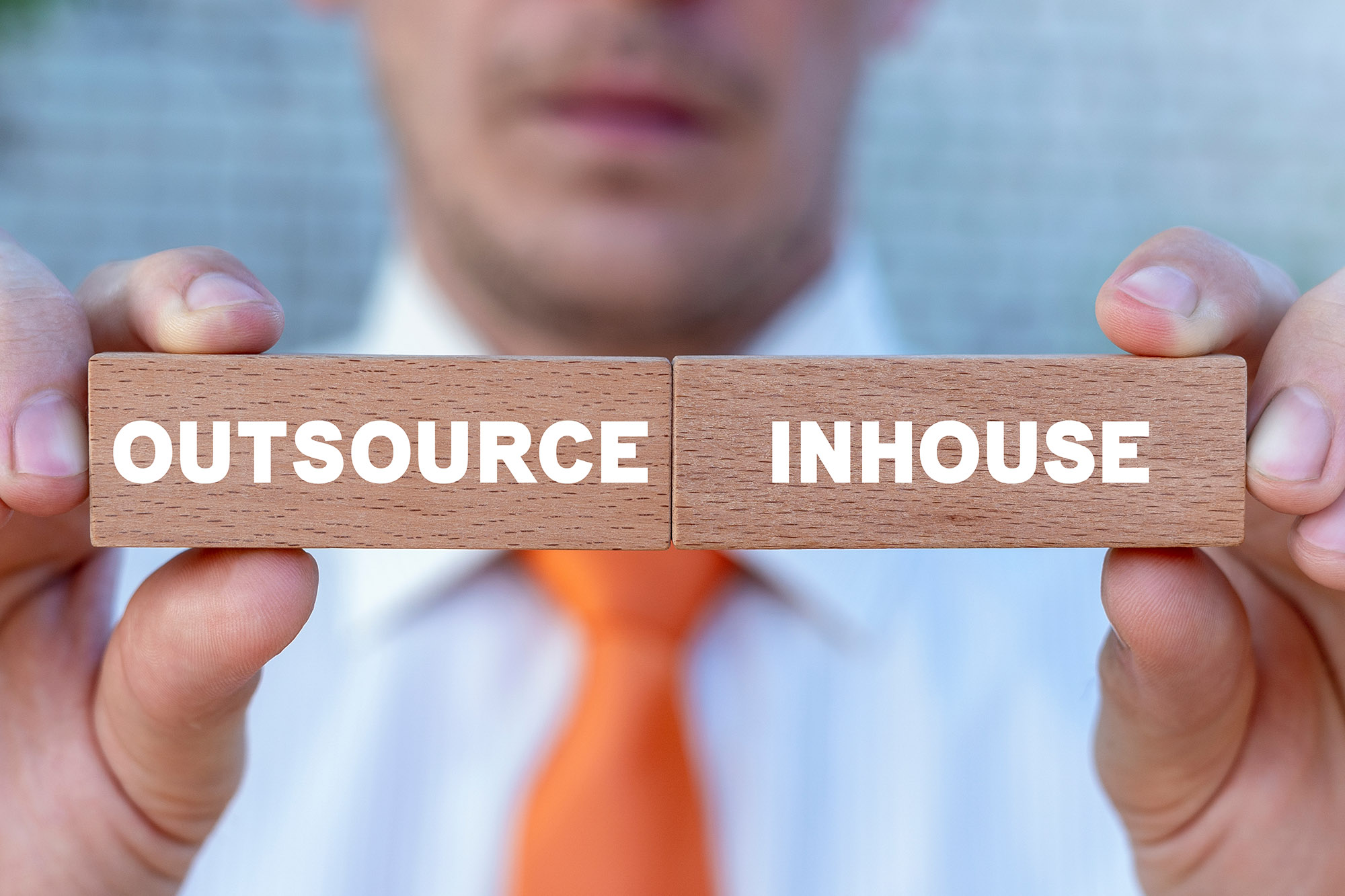 Outsourcing vs Hiring In-House: The Cost-Efficient Guide to Graphic Design Solutions for Modern Businesses